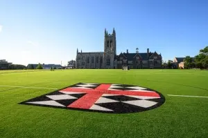 St. George's School dragon crest painted on the athletic field